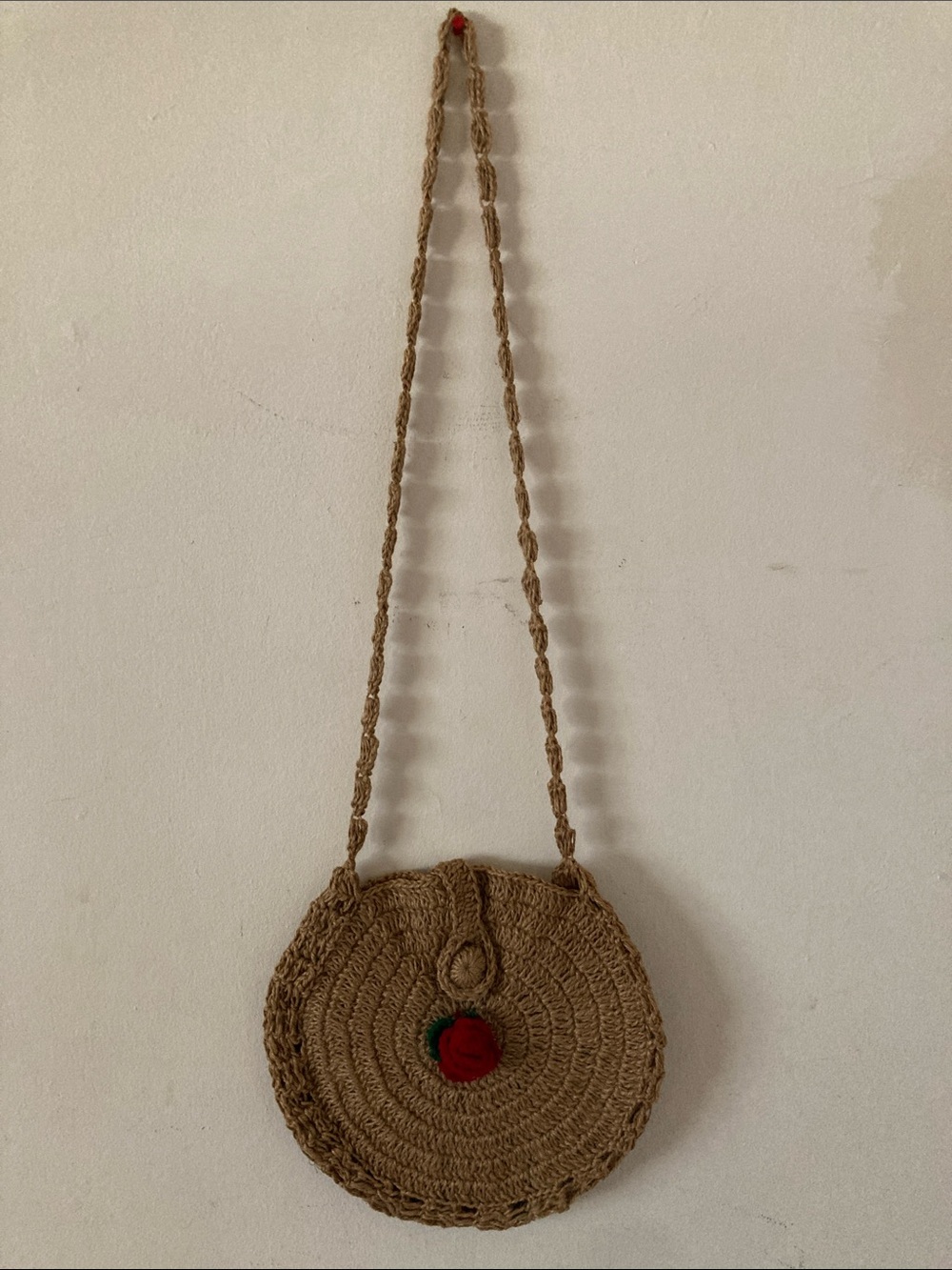Handwoven Round Straw Crossbody Jute Bag in Brown with Red Rose Motif